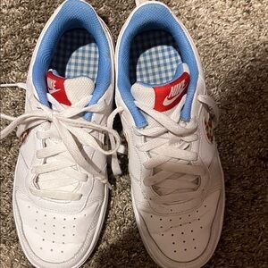 Nike Kids White Sneakers with Blue Lining and Red Tongue Logo